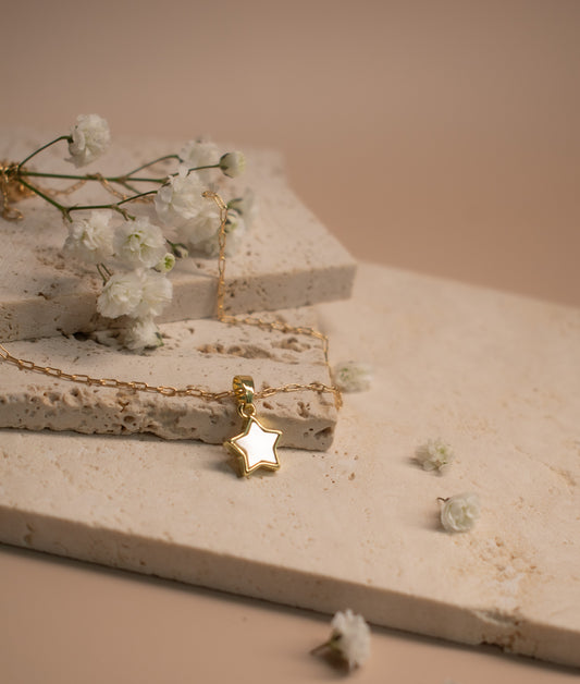Tiny mother of pearl star necklace