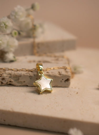 Tiny mother of pearl star necklace